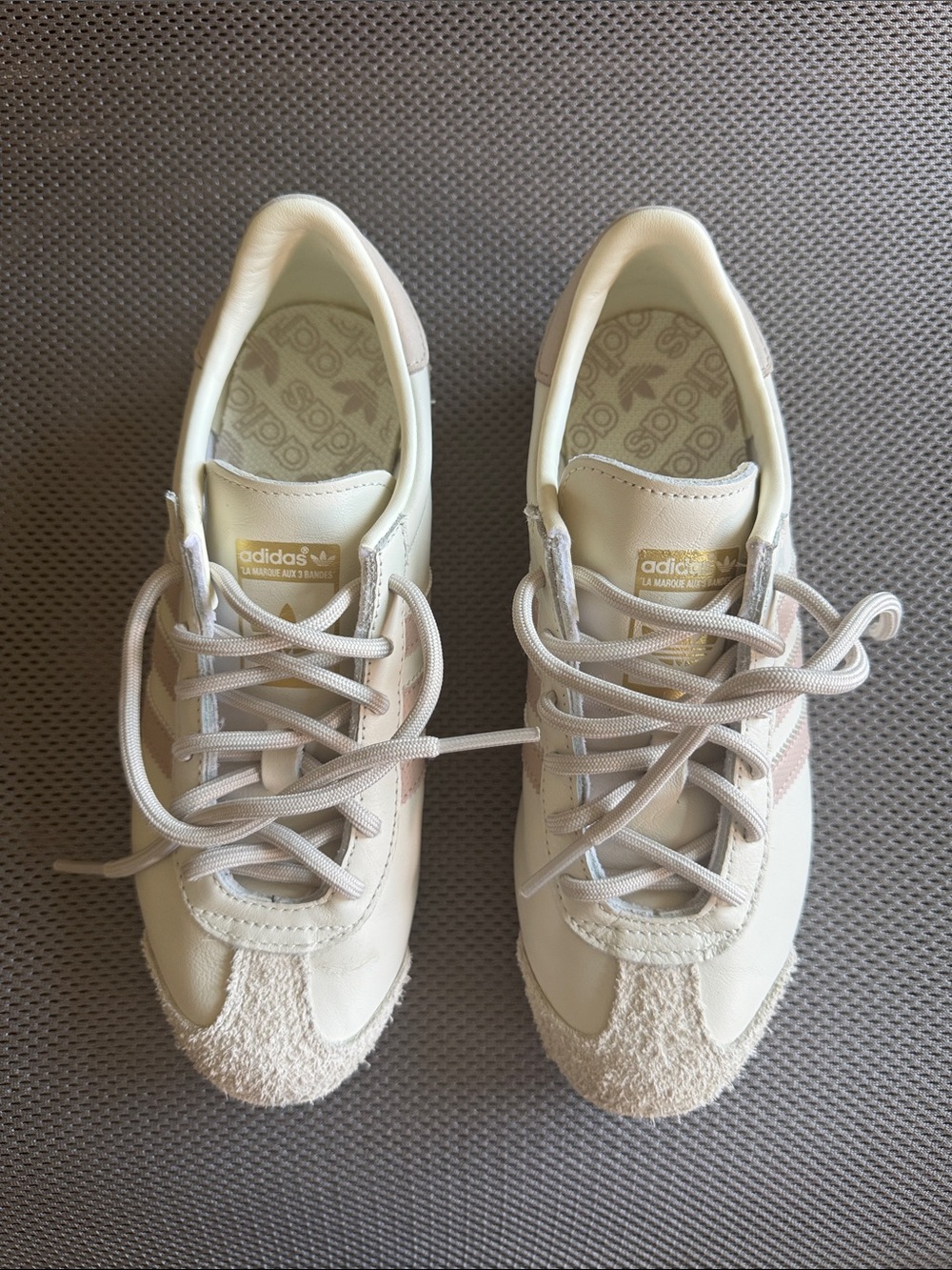 adidas Women’s Cream Sneaker with Pink Accents